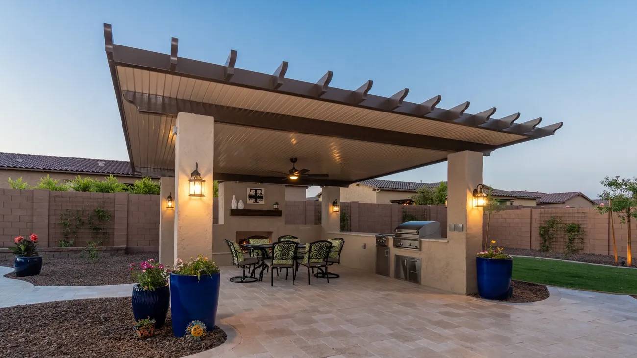 A patio with an outdoor kitchen and dining area.